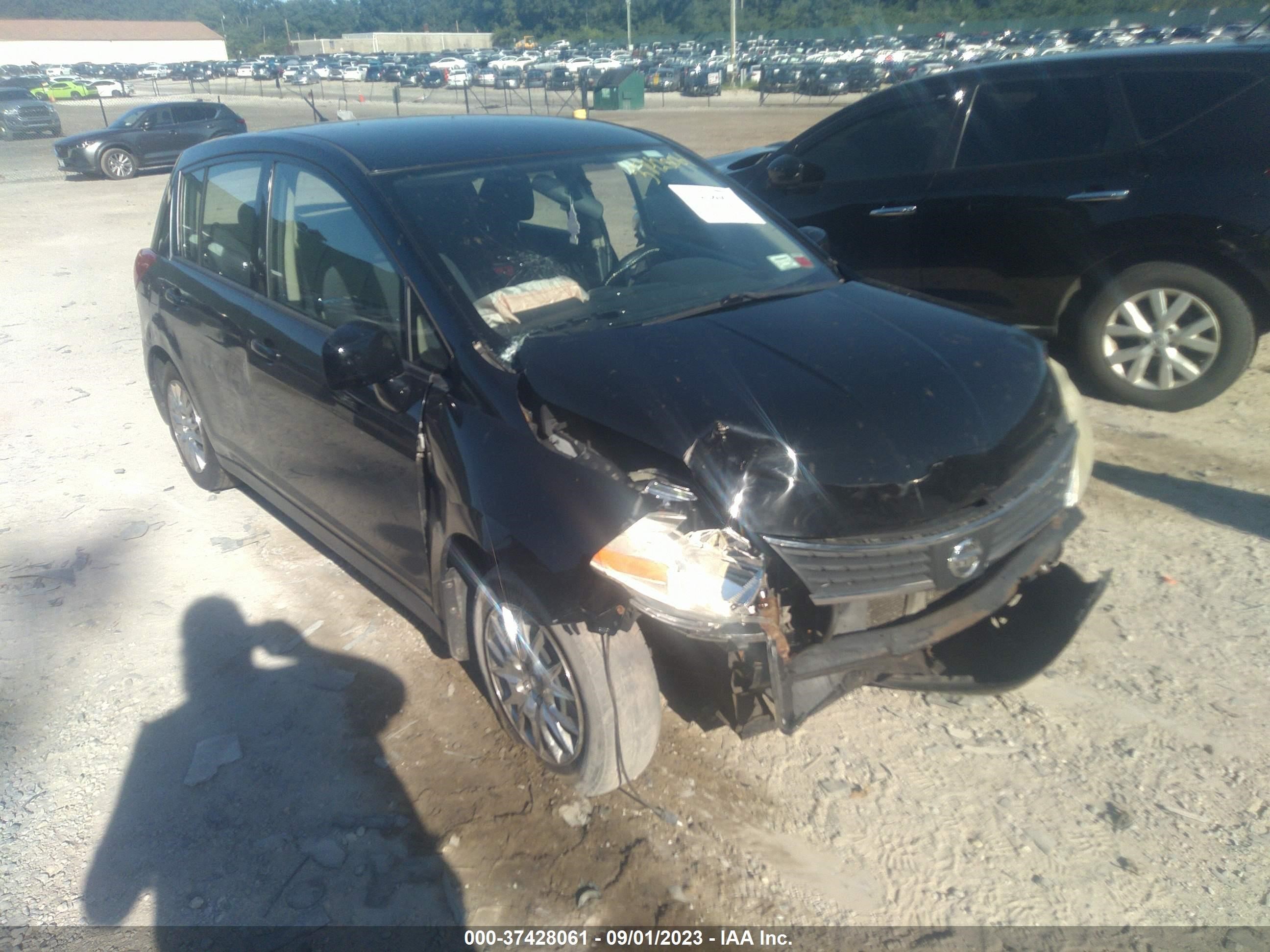 Photo 5 VIN: 3N1BC13E79L390370 - NISSAN VERSA 