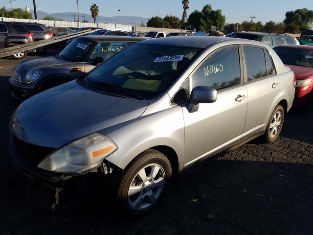 Photo 1 VIN: 3N1BC1AP0BL433151 - NISSAN VERSA S 