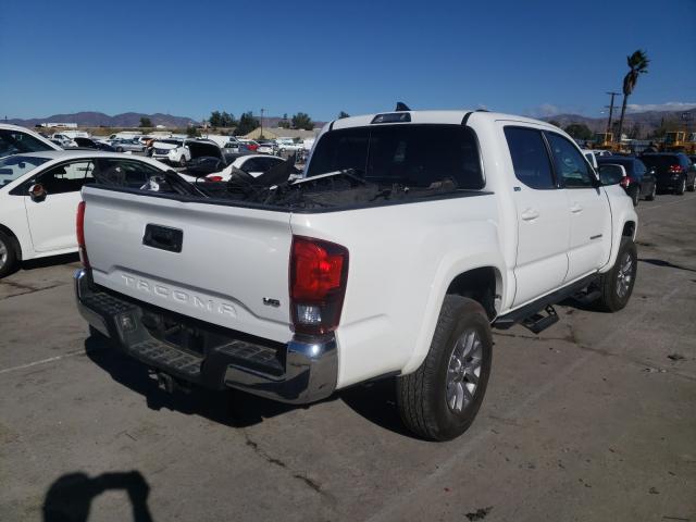 Photo 3 VIN: 3TMAZ5CN2KM097216 - TOYOTA TACOMA DOU 