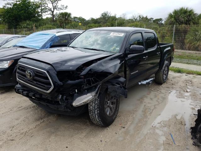 Photo 1 VIN: 3TMAZ5CN3KM107610 - TOYOTA TACOMA DOU 