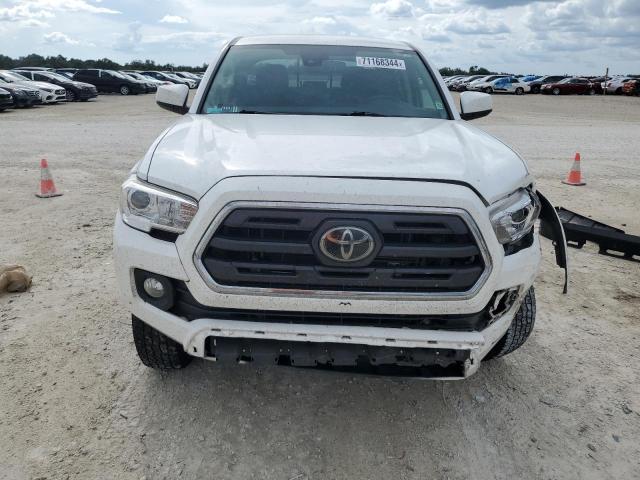 Photo 4 VIN: 3TMAZ5CN6KM111134 - TOYOTA TACOMA DOU 