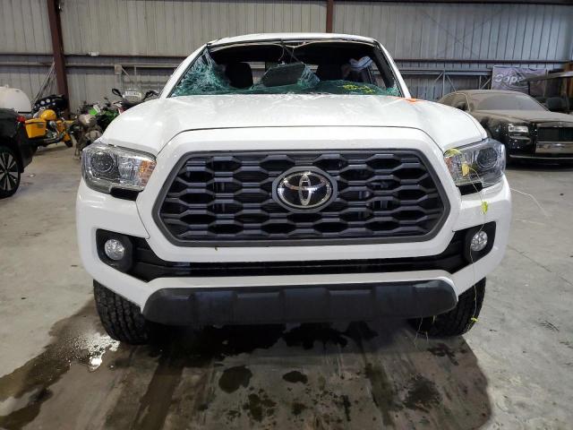 Photo 4 VIN: 3TMAZ5CN8PM211307 - TOYOTA TACOMA DOU 