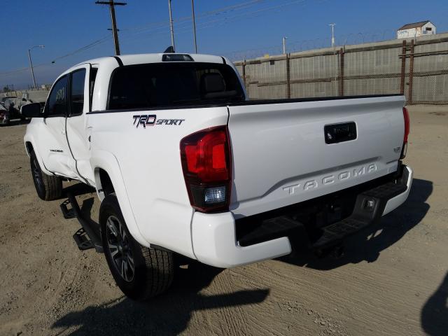 Photo 2 VIN: 3TMAZ5CN9KM110060 - TOYOTA TACOMA DOU 