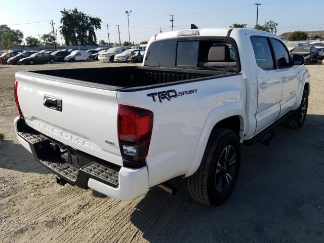 Photo 3 VIN: 3TMAZ5CN9KM110060 - TOYOTA TACOMA DOU 