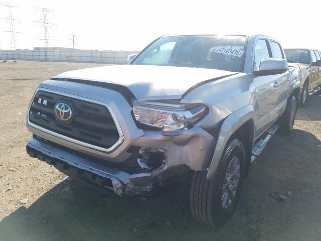 Photo 1 VIN: 3TMCZ5AN0KM230843 - TOYOTA TACOMA DOU 