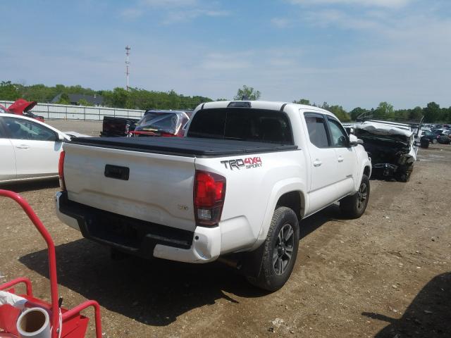 Photo 3 VIN: 3TMCZ5AN1KM252723 - TOYOTA TACOMA DOU 