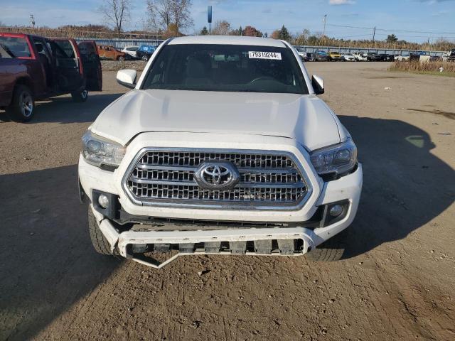 Photo 4 VIN: 3TMCZ5ANXHM055543 - TOYOTA TACOMA DOU 