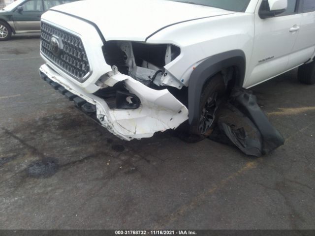 Photo 5 VIN: 3TMCZ5ANXKM211832 - TOYOTA TACOMA 4WD 