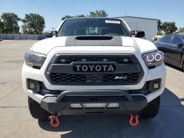 Photo 4 VIN: 3TMCZ5ANXKM220434 - TOYOTA TACOMA DOU 