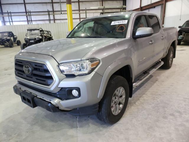 Photo 1 VIN: 3TMDZ5BN1JM047999 - TOYOTA TACOMA DOU 