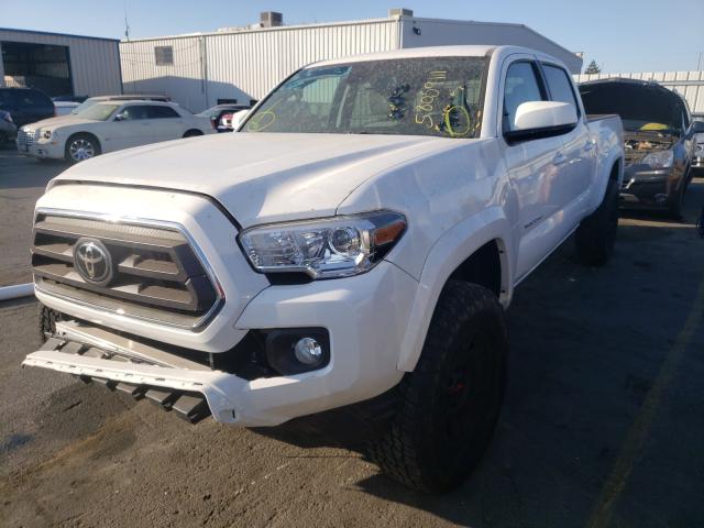 Photo 1 VIN: 3TMDZ5BN1MM116825 - TOYOTA TACOMA DOU 