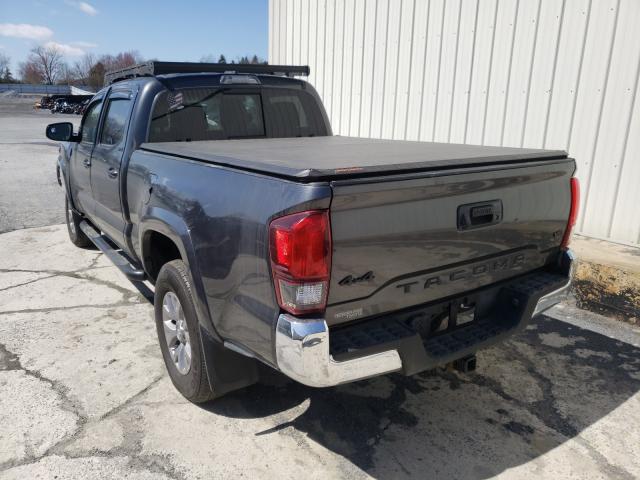 Photo 2 VIN: 3TMDZ5BN2KM058799 - TOYOTA TACOMA DOU 