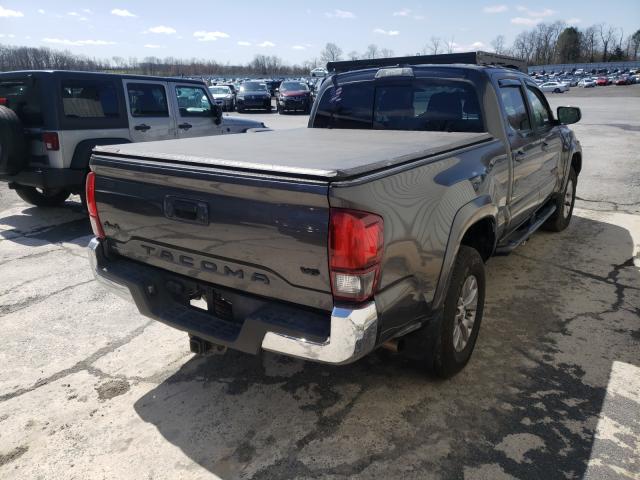 Photo 3 VIN: 3TMDZ5BN2KM058799 - TOYOTA TACOMA DOU 