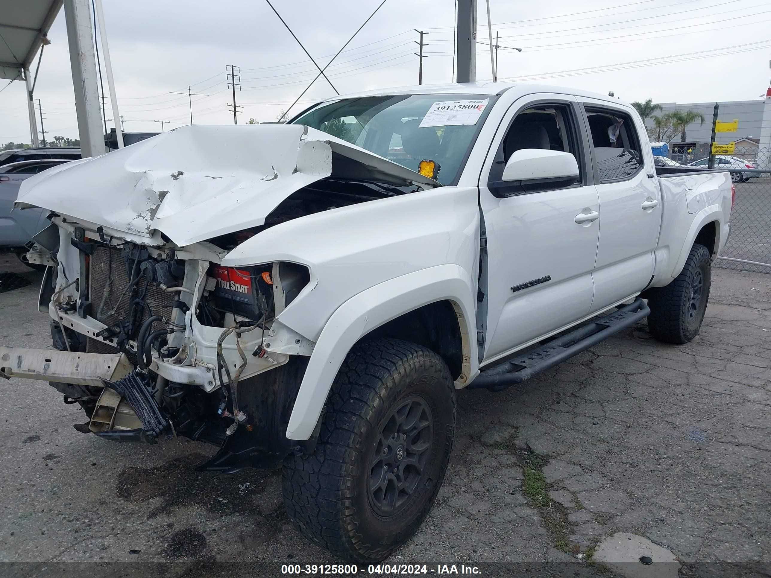 Photo 1 VIN: 3TMDZ5BN6GM002498 - TOYOTA TACOMA 