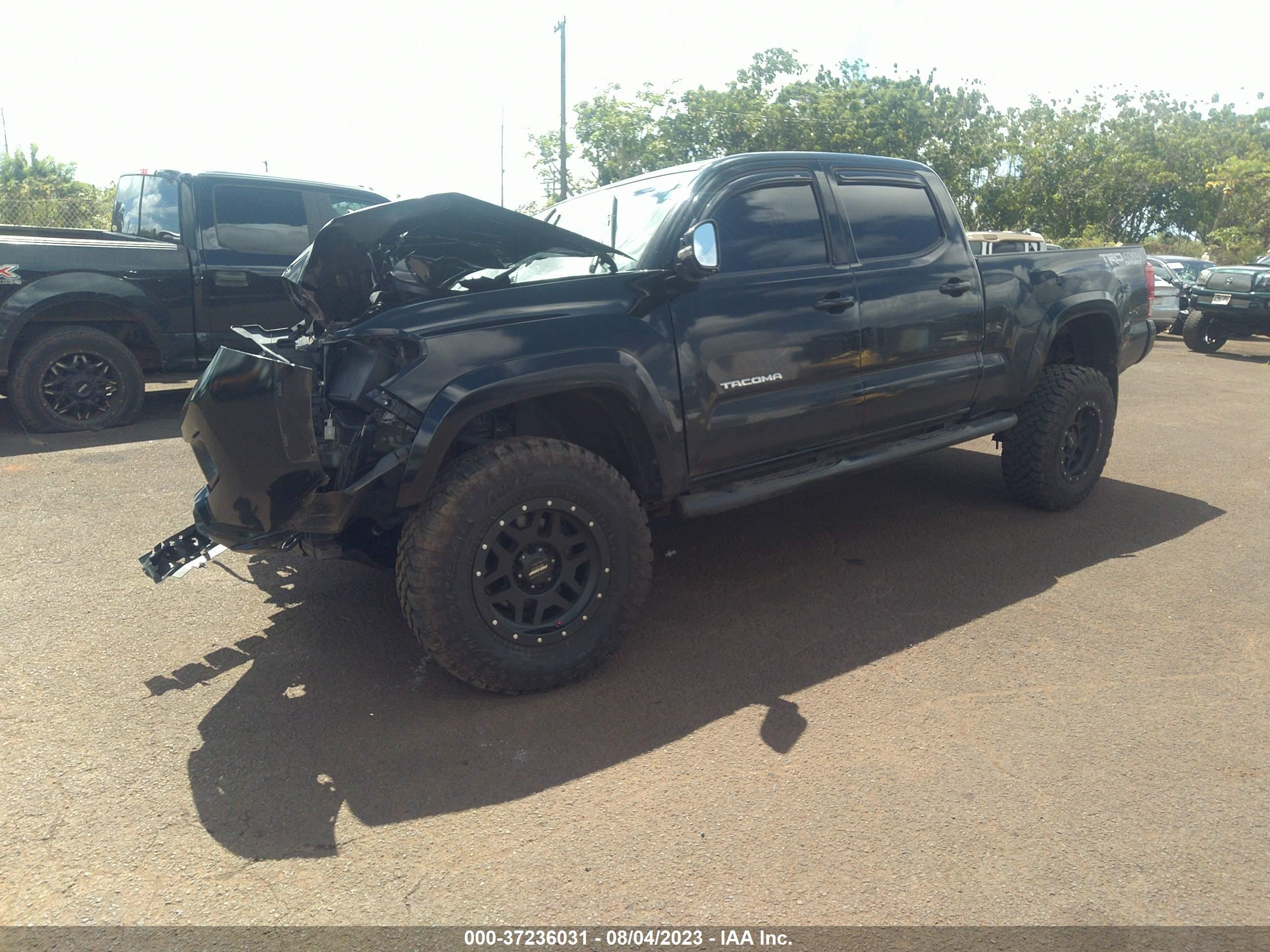 Photo 1 VIN: 3TMDZ5BN6GM011203 - TOYOTA TACOMA 