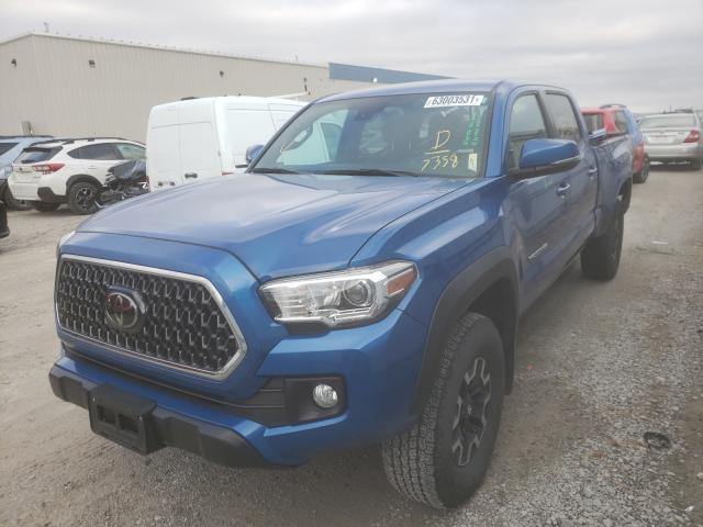 Photo 1 VIN: 3TMDZ5BN7JM047358 - TOYOTA TACOMA DOU 