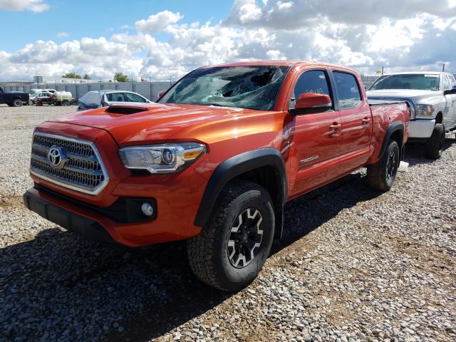 Photo 1 VIN: 3TMDZ5BN9GM009106 - TOYOTA TACOMA DOU 