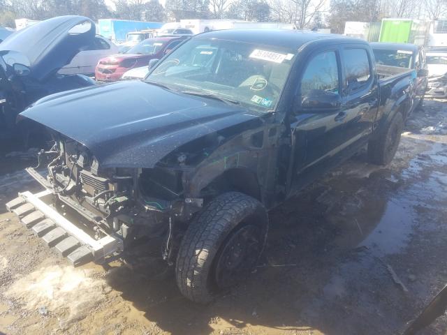 Photo 1 VIN: 3TMDZ5BNXGM009289 - TOYOTA TACOMA DOU 