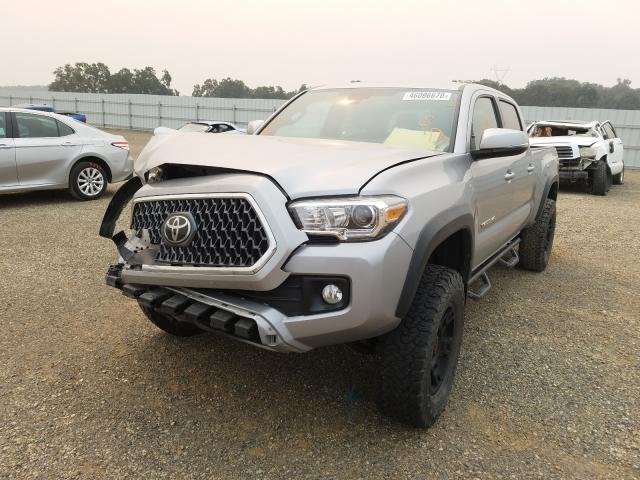 Photo 1 VIN: 3TMDZ5BNXKM058355 - TOYOTA TACOMA DOU 