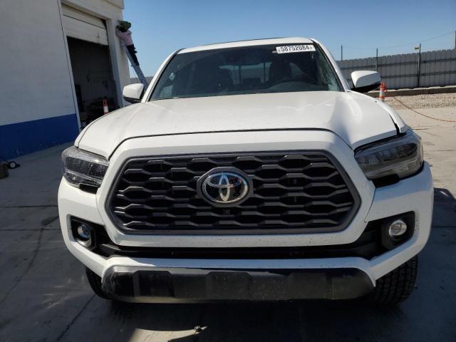 Photo 4 VIN: 3TMDZ5BNXPM168992 - TOYOTA TACOMA DOU 