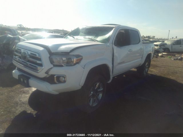 Photo 1 VIN: 3TMGZ5AN0KM272818 - TOYOTA TACOMA 4WD 