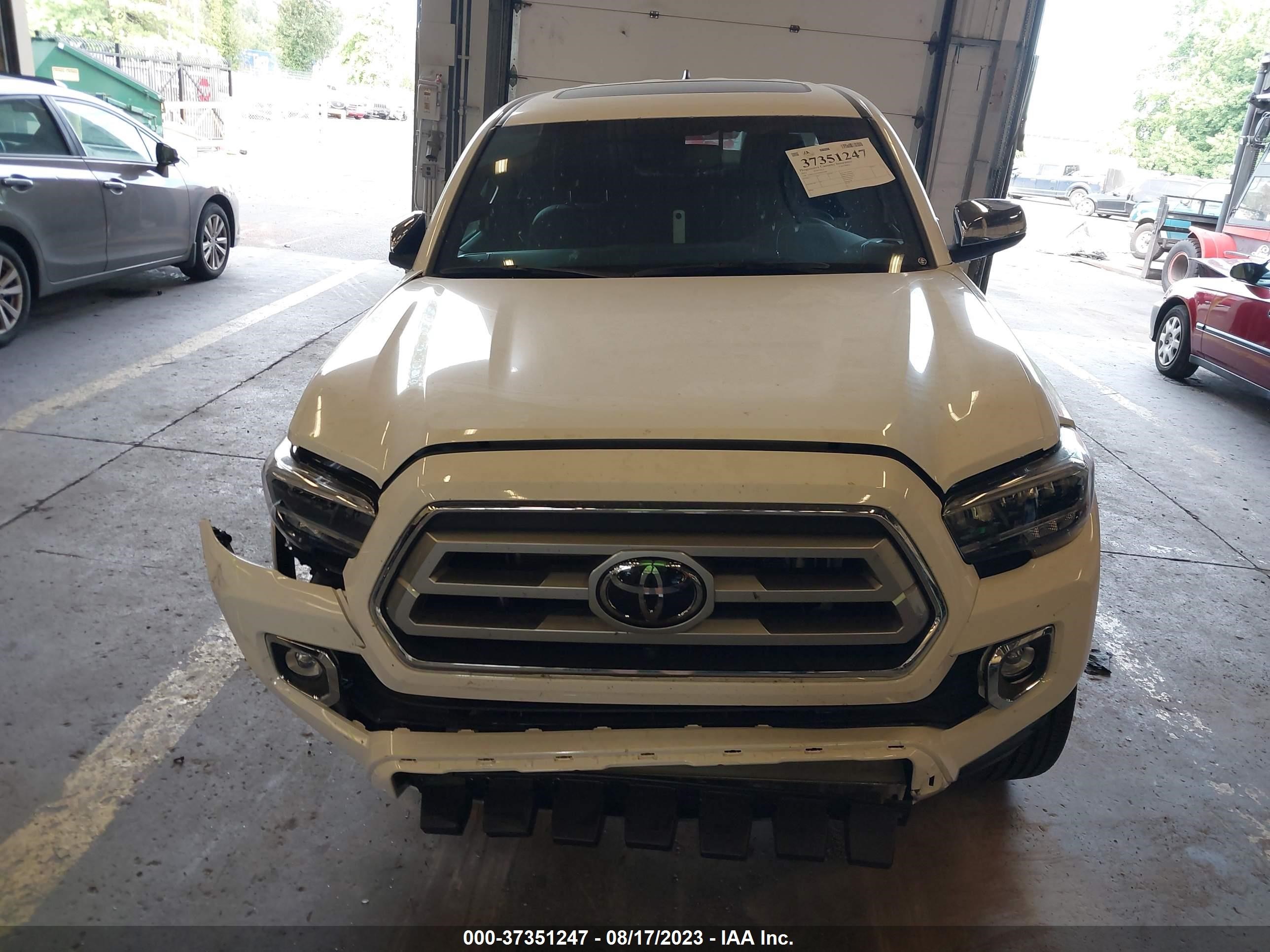 Photo 12 VIN: 3TMGZ5AN2PM567698 - TOYOTA TACOMA 