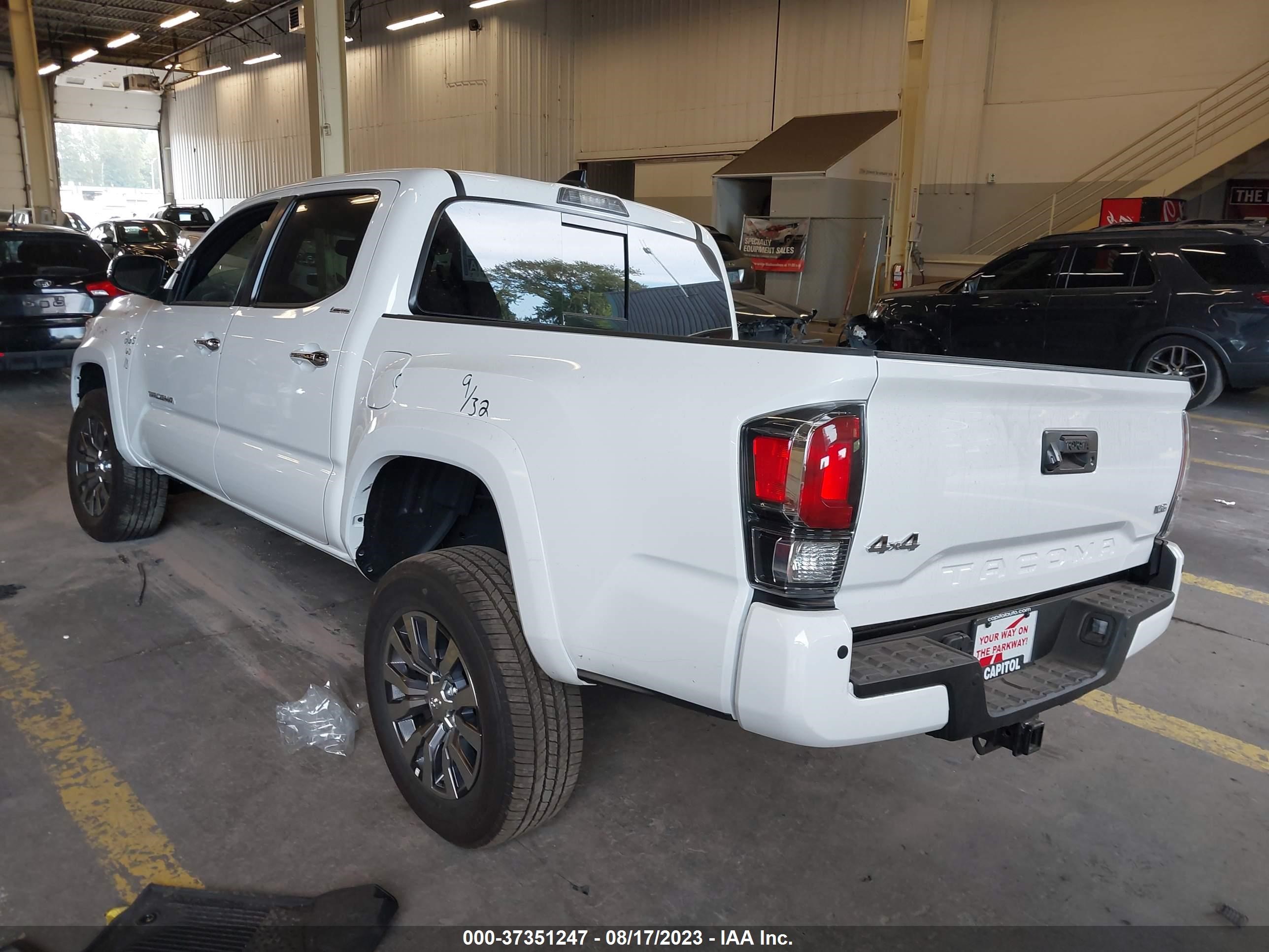 Photo 2 VIN: 3TMGZ5AN2PM567698 - TOYOTA TACOMA 