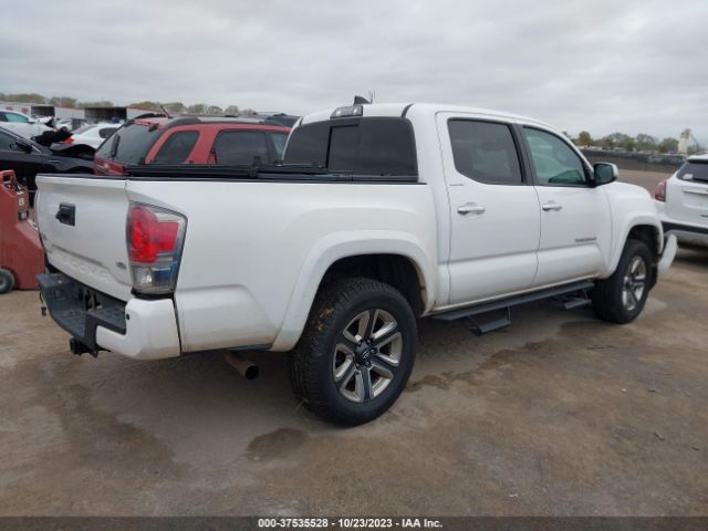 Photo 3 VIN: 3TMGZ5ANXKM252981 - TOYOTA TACOMA 