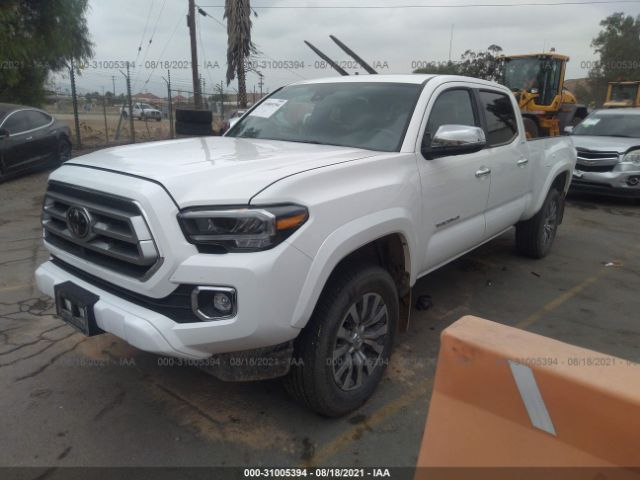 Photo 1 VIN: 3TMHZ5BN5MM100662 - TOYOTA TACOMA 4WD 