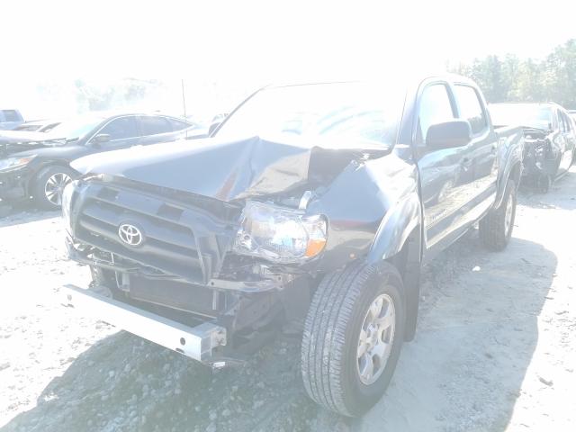 Photo 1 VIN: 3TMJU4GN8AM094810 - TOYOTA TACOMA DOU 