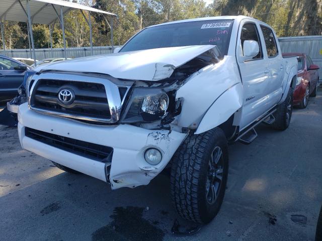 Photo 1 VIN: 3TMJU4GN9AM101585 - TOYOTA TACOMA DOU 