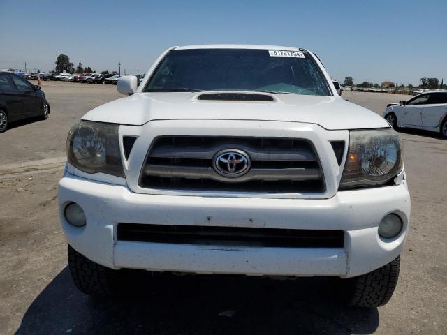 Photo 4 VIN: 3TMJU4GNXAM099930 - TOYOTA TACOMA DOU 