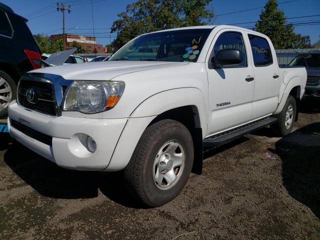 Photo 1 VIN: 3TMLU4EN9BM074899 - TOYOTA TACOMA DOU 