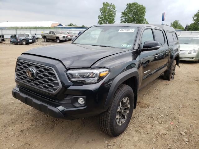 Photo 1 VIN: 3TYDZ5BN0MT002402 - TOYOTA TACOMA DOU 