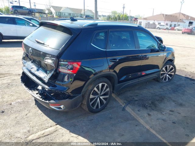 Photo 3 VIN: 3VVLX7B29NM033634 - VOLKSWAGEN TAOS 