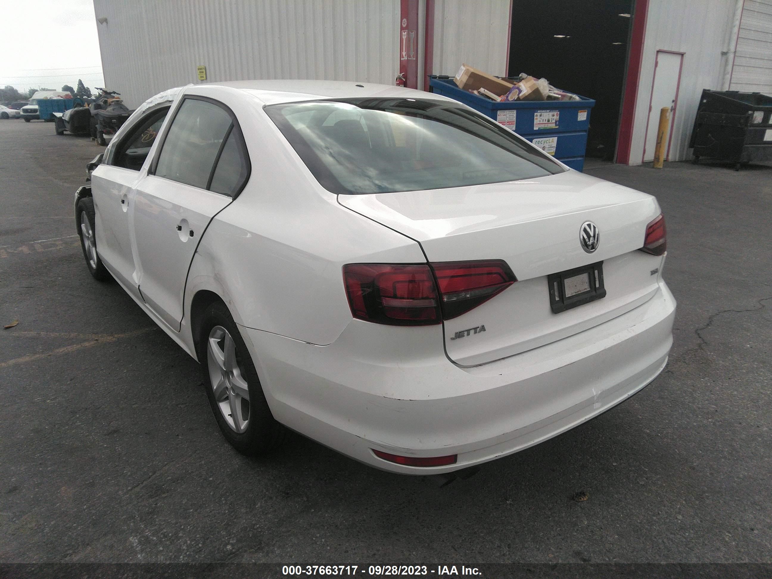 Photo 2 VIN: 3VW267AJXGM376572 - VOLKSWAGEN JETTA 