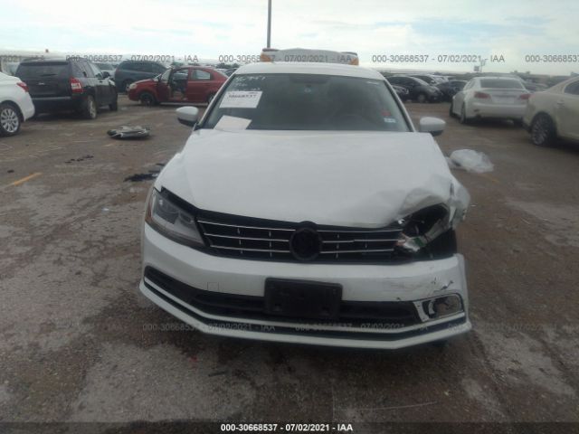 Photo 5 VIN: 3VW2B7AJXJM254393 - VOLKSWAGEN JETTA 