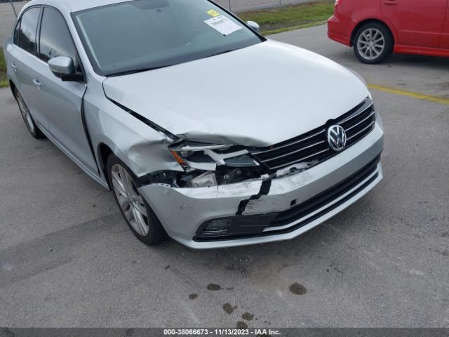 Photo 5 VIN: 3VW3A7AJ6FM331162 - VOLKSWAGEN JETTA SEDAN 