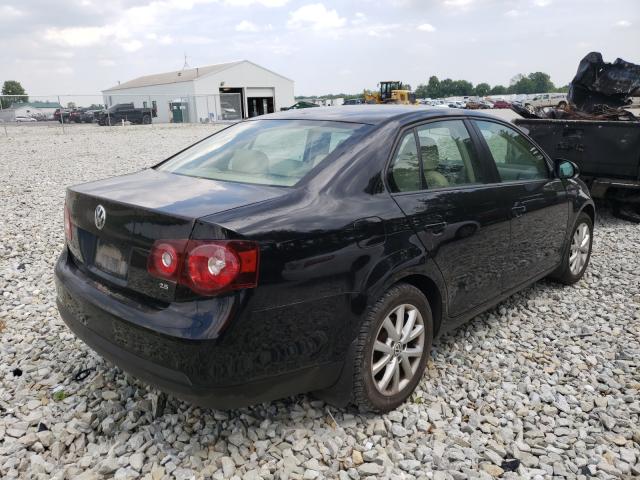 Photo 3 VIN: 3VWAX7AJXAM104877 - VOLKSWAGEN JETTA LIMI 