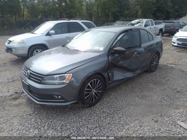 Photo 1 VIN: 3VWB17AJ0GM272607 - VOLKSWAGEN JETTA SEDAN 