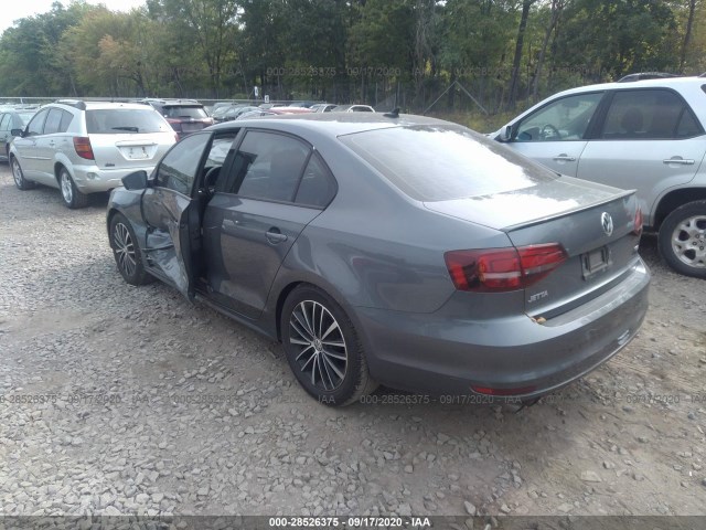 Photo 2 VIN: 3VWB17AJ0GM272607 - VOLKSWAGEN JETTA SEDAN 