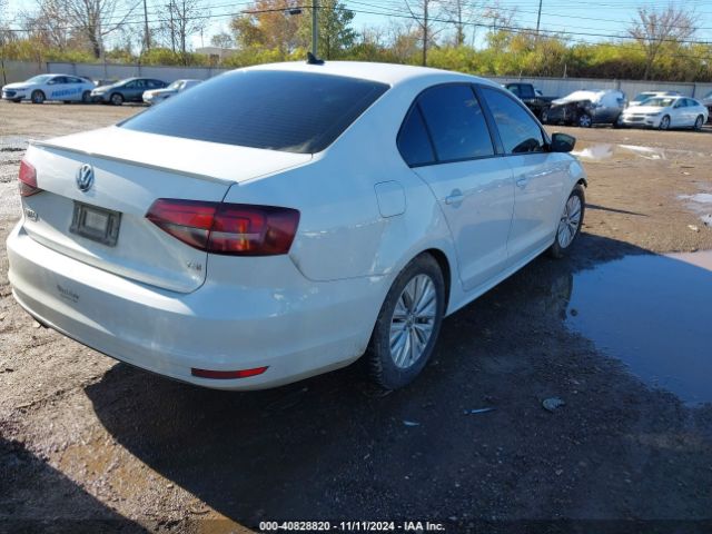 Photo 3 VIN: 3VWB17AJ3GM265649 - VOLKSWAGEN JETTA 