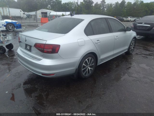 Photo 3 VIN: 3VWB67AJ2GM268673 - VOLKSWAGEN JETTA SEDAN 