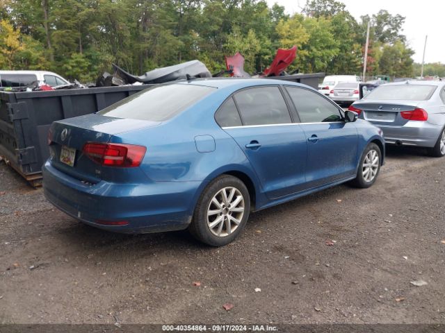 Photo 3 VIN: 3VWB67AJ4HM300556 - VOLKSWAGEN JETTA 