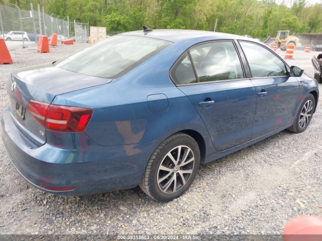 Photo 3 VIN: 3VWB67AJ7GM402593 - VOLKSWAGEN JETTA 