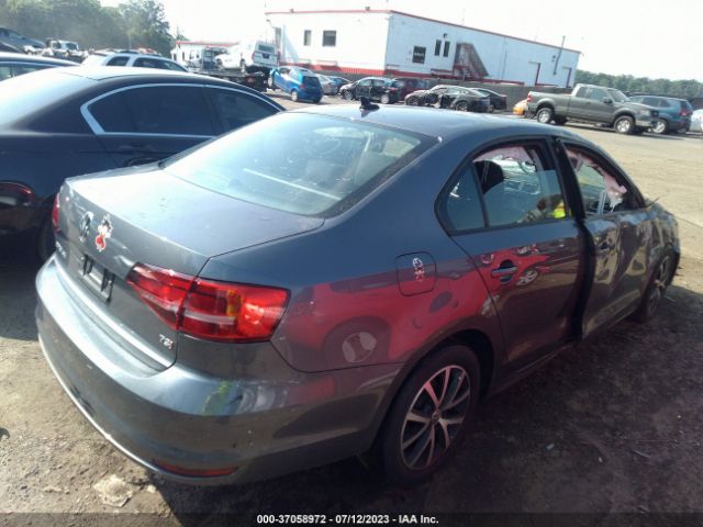 Photo 3 VIN: 3VWB67AJXGM273605 - VOLKSWAGEN JETTA 