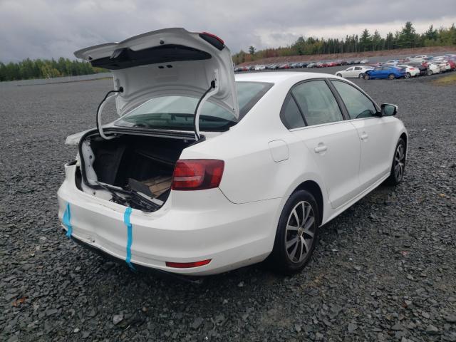 Photo 3 VIN: 3VWD07AJ1GM377720 - VOLKSWAGEN JETTA COMF 