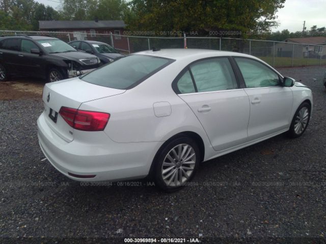 Photo 3 VIN: 3VWD07AJ2FM402929 - VOLKSWAGEN JETTA 