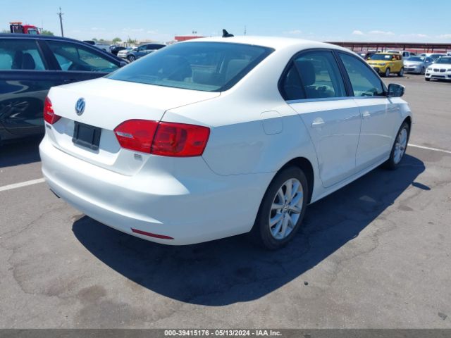 Photo 3 VIN: 3VWD07AJ3EM357465 - VOLKSWAGEN JETTA 