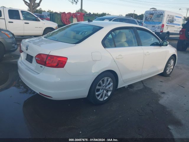 Photo 3 VIN: 3VWD07AJ3EM388845 - VOLKSWAGEN JETTA 